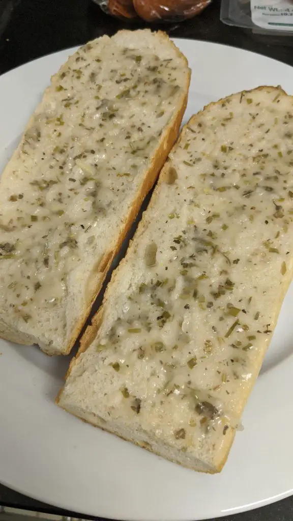 italian sub dressing spread on bread
